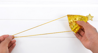 Glittery mini hat with gold star
