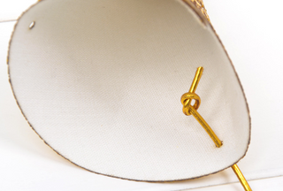 Glittery mini hat with gold star